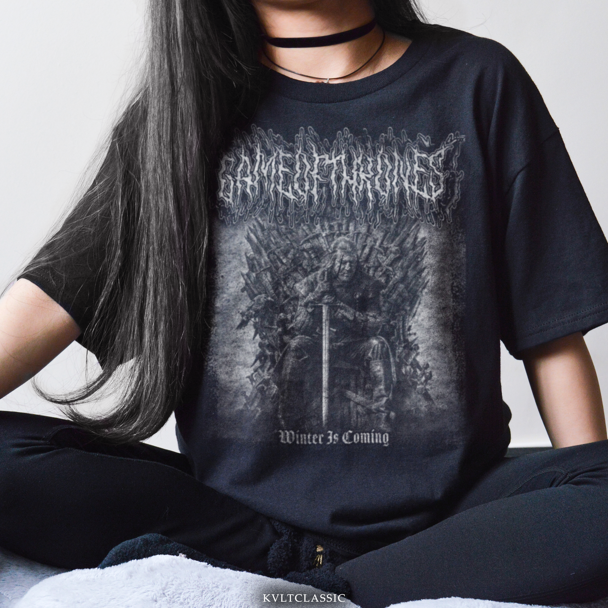 Black t-shirt with Game of Thrones Iron Throne graphic and "Winter Is Coming" text.